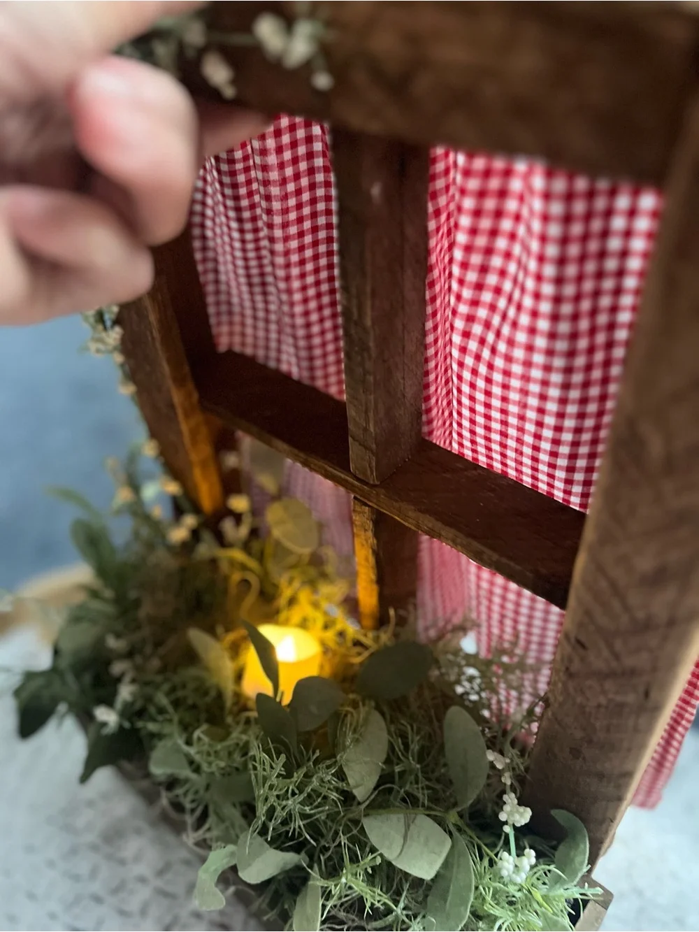 Rustic Windowbox Accent with Greenery and Soft Candle Light